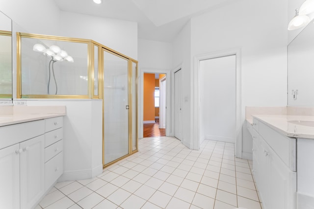 918 SW Blue Stem Way, Stuart, FL 34997 - full bath with two vanities, a shower stall, and tile patterned flooring