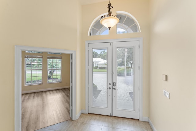 918 SW Blue Stem Way, Stuart, FL 34997 - foyer entrance featuring plenty of natural light, french doors, and a towering ceiling