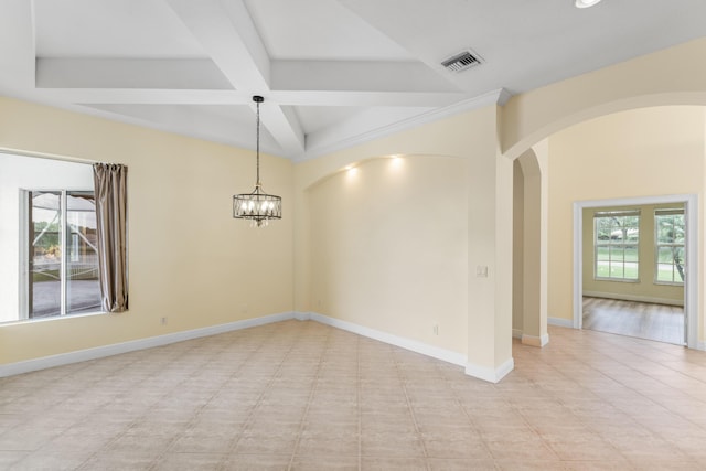 918 SW Blue Stem Way, Stuart, FL 34997 - empty room with arched walkways, beamed ceiling, coffered ceiling, a chandelier, and light tile patterned floors