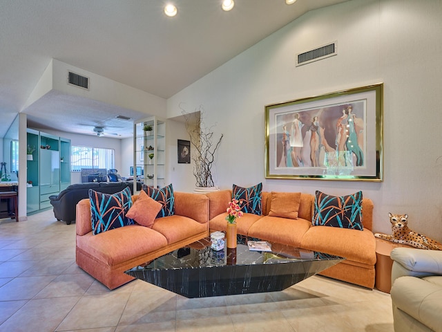 10828 Lake Palm Ln Unit 202, Boynton Beach, FL 33437 - tiled living area with vaulted ceiling and recessed lighting