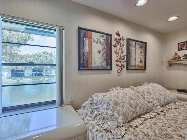 10828 Lake Palm Ln Unit 202, Boynton Beach, FL 33437 - bedroom featuring multiple windows and recessed lighting
