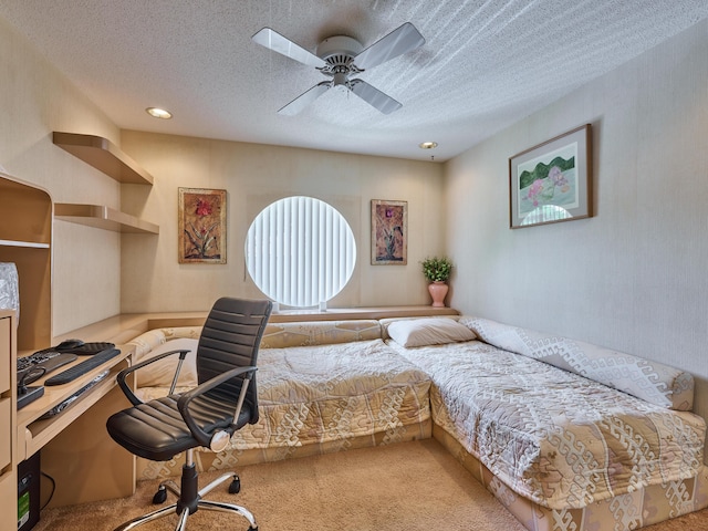 10828 Lake Palm Ln Unit 202, Boynton Beach, FL 33437 - bedroom with a textured ceiling, carpet floors, a desk, and ceiling fan