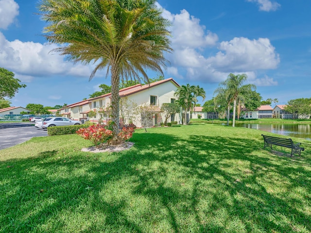 10828 Lake Palm Ln Unit 202, Boynton Beach, FL 33437 - view of grassy yard featuring a water view
