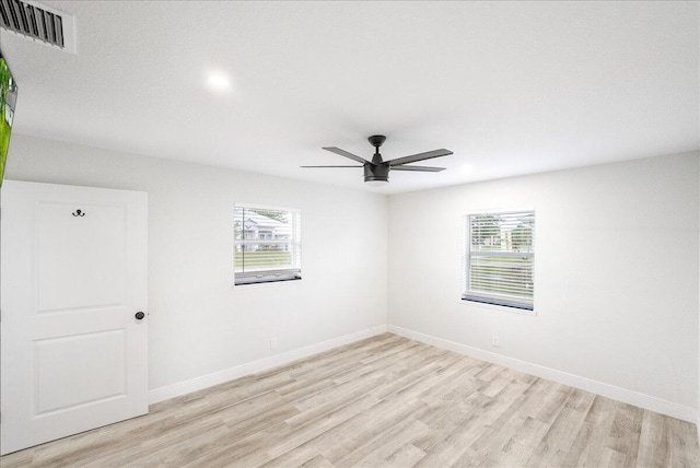 673 NE Horizon Ln, Port Saint Lucie, FL 34983 - unfurnished room featuring light wood-type flooring and ceiling fan