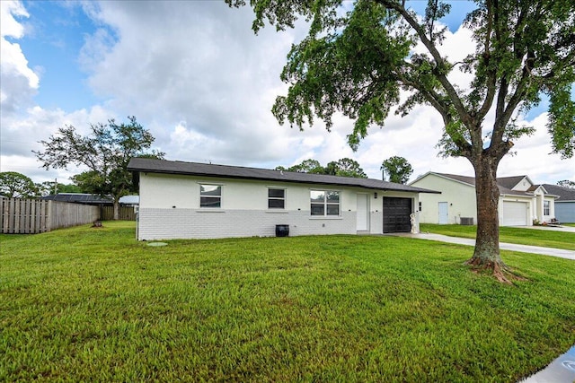 673 NE Horizon Ln, Port Saint Lucie, FL 34983 - view of front of property featuring an attached garage, concrete driveway, and brick siding