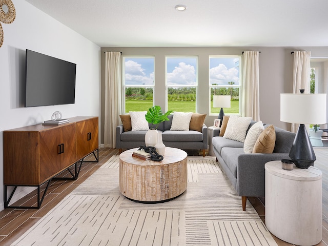 14328 SW Rain Rd, Indiantown, FL 34956 - living area featuring wood finished floors and recessed lighting
