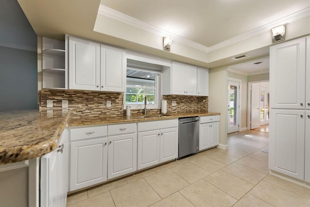 1546 35th Ave, Vero Beach, FL 32960 - kitchen with dishwasher, open shelves, decorative backsplash, white cabinets, and crown molding