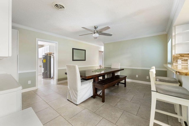 1546 35th Ave, Vero Beach, FL 32960 - dining room featuring a ceiling fan, electric water heater, crown molding, and light tile patterned floors