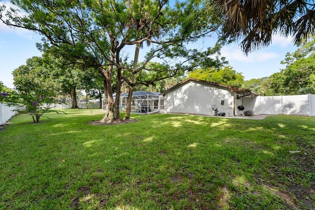 1546 35th Ave, Vero Beach, FL 32960 - fenced backyard featuring a lanai