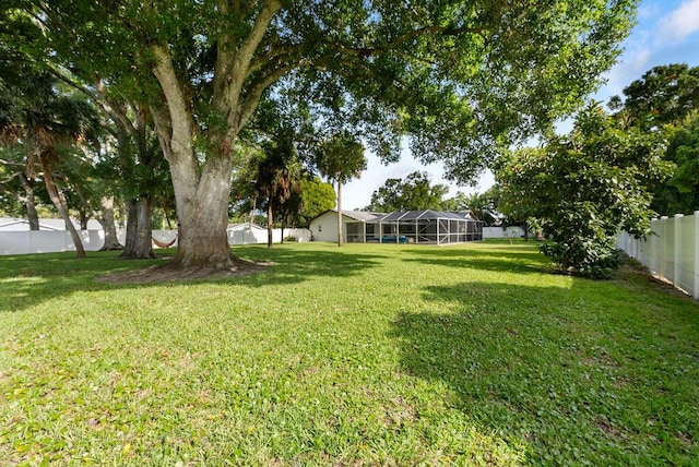 1546 35th Ave, Vero Beach, FL 32960 - fenced backyard featuring glass enclosure