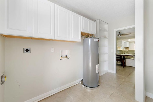1546 35th Ave, Vero Beach, FL 32960 - laundry room featuring water heater, hookup for an electric dryer, cabinet space, washer hookup, and light tile patterned floors