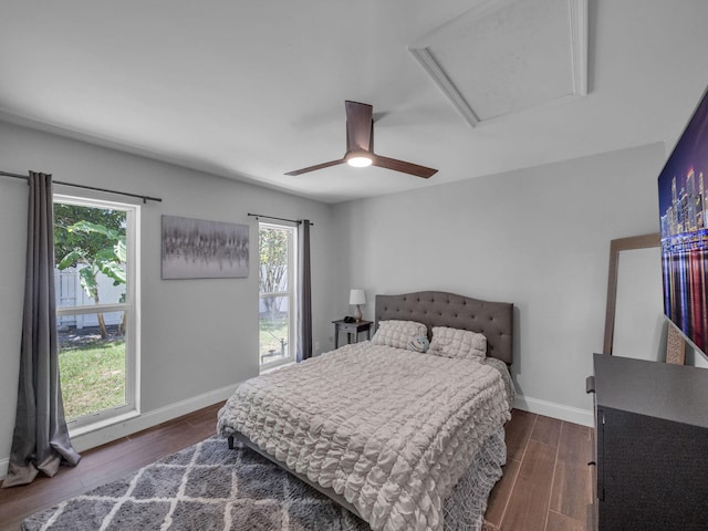 17516 Birchwood Dr, Boca Raton, FL 33487 - bedroom with dark wood-style floors, attic access, and ceiling fan