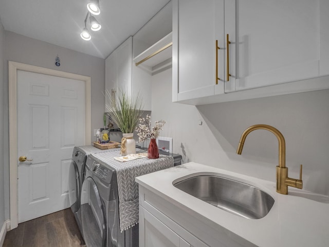17516 Birchwood Dr, Boca Raton, FL 33487 - washroom with separate washer and dryer, cabinet space, and dark wood finished floors