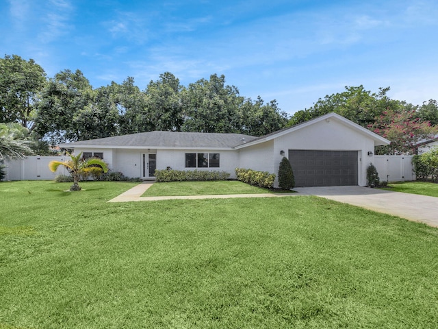 17516 Birchwood Dr, Boca Raton, FL 33487 - ranch-style home featuring an attached garage, driveway, and a gate