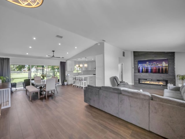 17516 Birchwood Dr, Boca Raton, FL 33487 - living area featuring a fireplace, lofted ceiling, ceiling fan, dark wood-style flooring, and recessed lighting