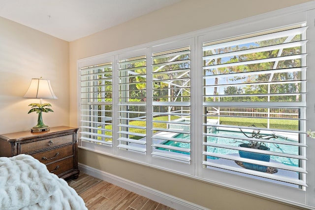 5885 SE Forest Glade Trl, Hobe Sound, FL 33455 - detailed view of baseboards and wood finished floors