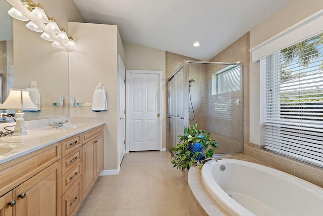 5885 SE Forest Glade Trl, Hobe Sound, FL 33455 - full bathroom featuring a garden tub, double vanity, a shower stall, recessed lighting, and tile patterned flooring