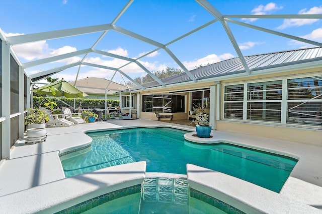 5885 SE Forest Glade Trl, Hobe Sound, FL 33455 - outdoor pool featuring a patio and glass enclosure