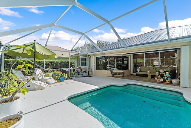 5885 SE Forest Glade Trl, Hobe Sound, FL 33455 - swimming pool featuring a patio, outdoor lounge area, and glass enclosure