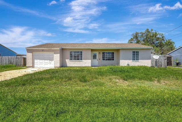 1669 SE N Blackwell Dr, Port Saint Lucie, FL 34952 - single story home featuring stucco siding, driveway, and an attached garage