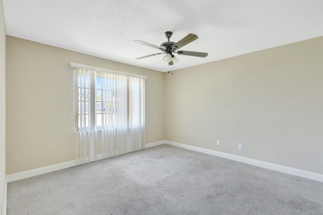 1669 SE N Blackwell Dr, Port Saint Lucie, FL 34952 - spare room with light colored carpet and a ceiling fan