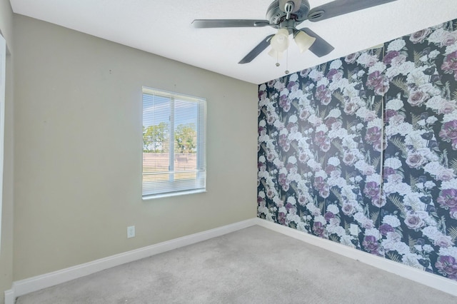 1669 SE N Blackwell Dr, Port Saint Lucie, FL 34952 - carpeted empty room featuring baseboards and ceiling fan