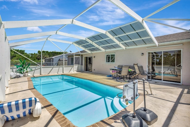 1669 SE N Blackwell Dr, Port Saint Lucie, FL 34952 - outdoor pool featuring a patio and glass enclosure