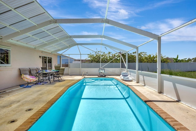 1669 SE N Blackwell Dr, Port Saint Lucie, FL 34952 - view of swimming pool with a patio and glass enclosure