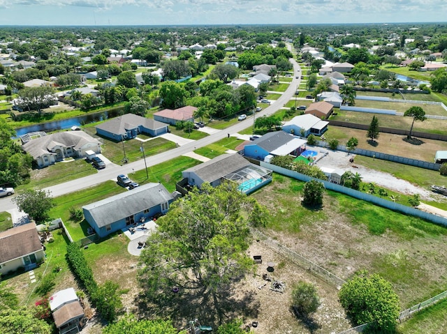 1669 SE N Blackwell Dr, Port Saint Lucie, FL 34952 - aerial perspective of suburban area featuring a large body of water