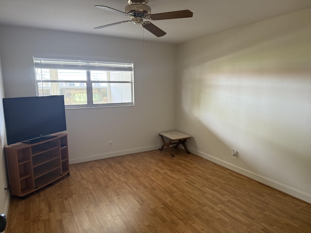 64 Waterford C, Delray Beach, FL 33446 - unfurnished room featuring a ceiling fan and wood finished floors