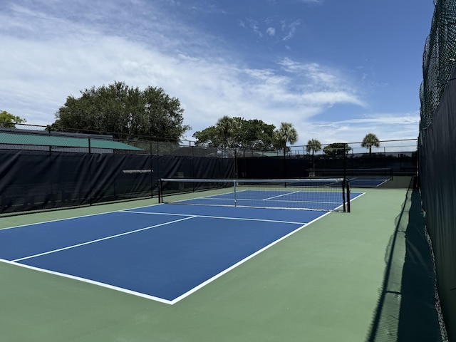 64 Waterford C, Delray Beach, FL 33446 - view of tennis court featuring community basketball court