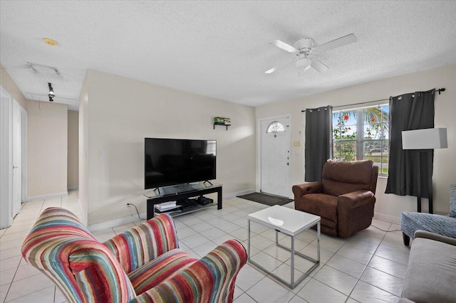 19309 Carolina Cir, Boca Raton, FL 33434 - living room with a textured ceiling, light tile patterned flooring, a ceiling fan, and track lighting