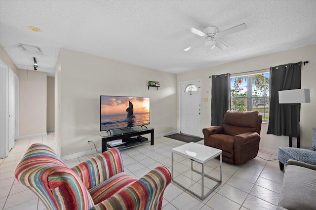 19309 Carolina Cir, Boca Raton, FL 33434 - living room with a textured ceiling, light tile patterned floors, ceiling fan, and track lighting