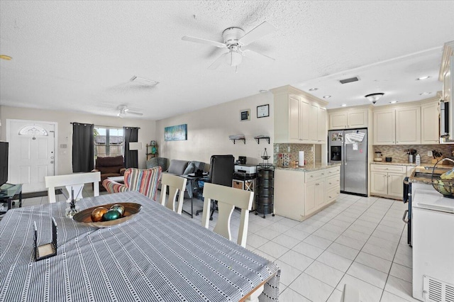 19309 Carolina Cir, Boca Raton, FL 33434 - dining area featuring a ceiling fan, a textured ceiling, light tile patterned floors, and recessed lighting