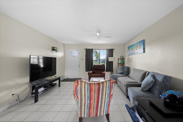 19309 Carolina Cir, Boca Raton, FL 33434 - living area featuring ceiling fan, a textured ceiling, and light tile patterned floors