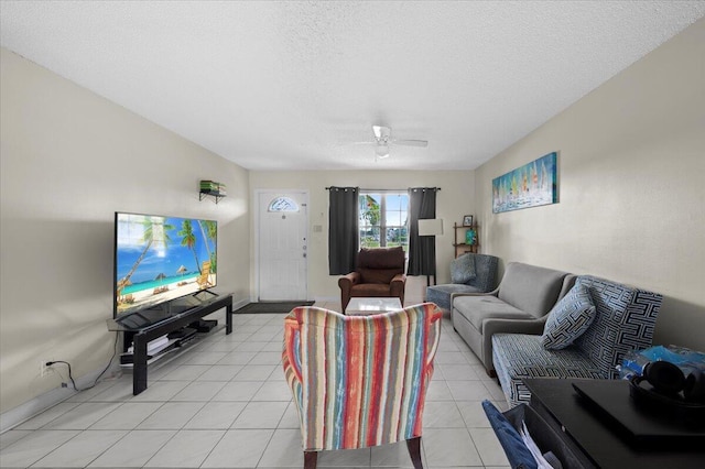 19309 Carolina Cir, Boca Raton, FL 33434 - living area featuring ceiling fan, a textured ceiling, and light tile patterned floors