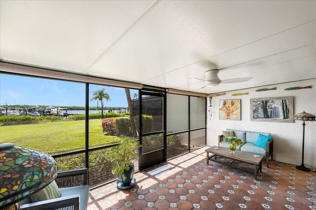 1102 SE Mitchell Ave Unit 302, Port Saint Lucie, FL 34952 - sunroom / solarium with ceiling fan and a water view