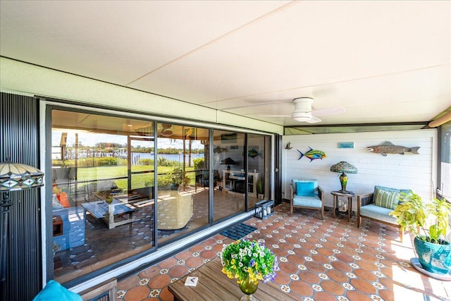 1102 SE Mitchell Ave Unit 302, Port Saint Lucie, FL 34952 - sunroom featuring a ceiling fan