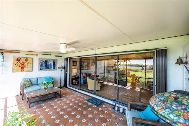 1102 SE Mitchell Ave Unit 302, Port Saint Lucie, FL 34952 - sunroom / solarium featuring ceiling fan and outdoor lounge area