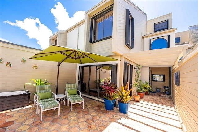 1102 SE Mitchell Ave Unit 302, Port Saint Lucie, FL 34952 - rear view of property with a patio