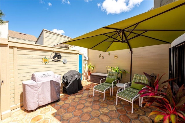 1102 SE Mitchell Ave Unit 302, Port Saint Lucie, FL 34952 - view of patio featuring grilling area