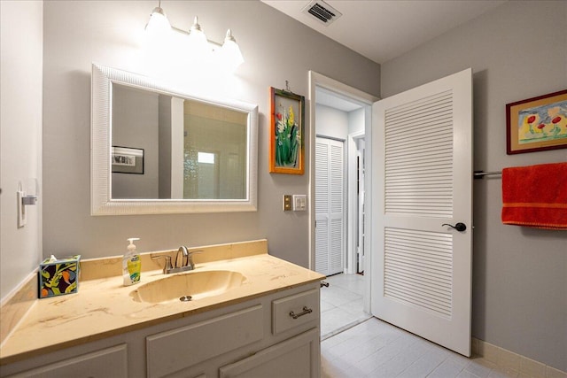 1102 SE Mitchell Ave Unit 302, Port Saint Lucie, FL 34952 - full bathroom with vanity and tile patterned flooring