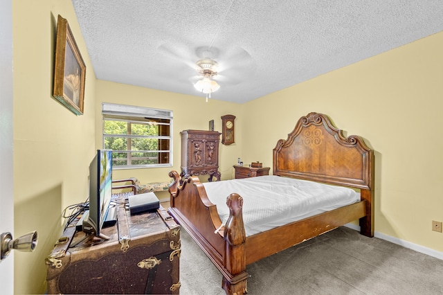 501 Normandy K, Delray Beach, FL 33484 - bedroom featuring a textured ceiling, carpet, and ceiling fan
