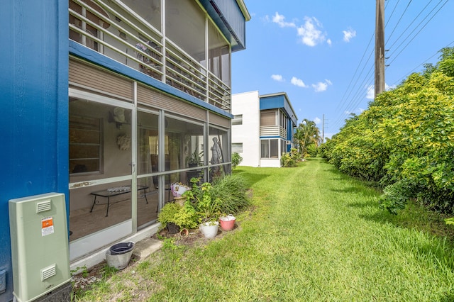 501 Normandy K, Delray Beach, FL 33484 - view of green lawn with a sunroom