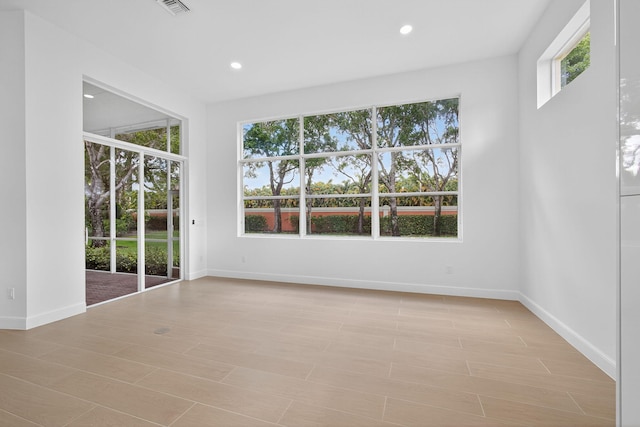 8873 Via Brilliante, Wellington, FL 33411 - empty room featuring recessed lighting