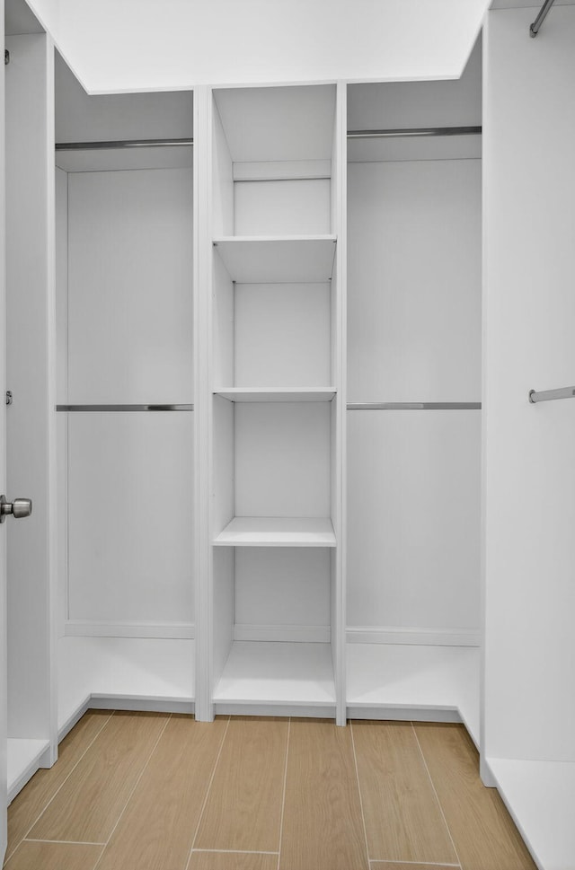 8873 Via Brilliante, Wellington, FL 33411 - spacious closet with wood finished floors