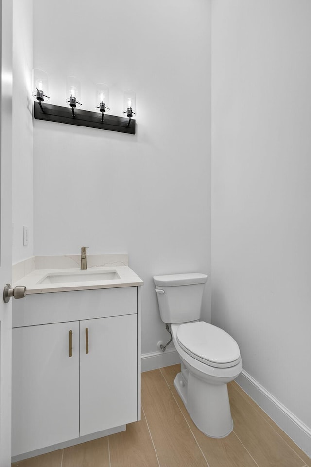 8873 Via Brilliante, Wellington, FL 33411 - bathroom featuring baseboards and vanity
