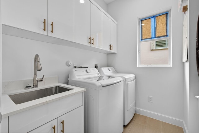 8873 Via Brilliante, Wellington, FL 33411 - washroom featuring separate washer and dryer and cabinet space