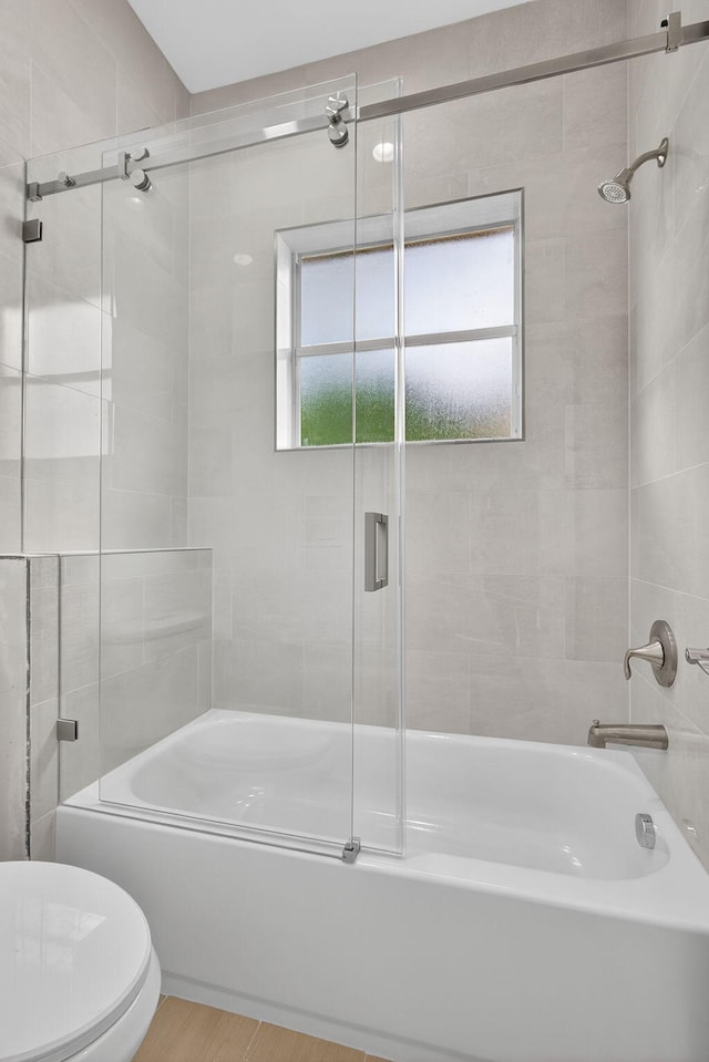 8873 Via Brilliante, Wellington, FL 33411 - full bath with plenty of natural light and combined bath / shower with glass door