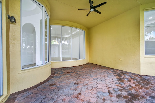 8873 Via Brilliante, Wellington, FL 33411 - unfurnished sunroom featuring lofted ceiling